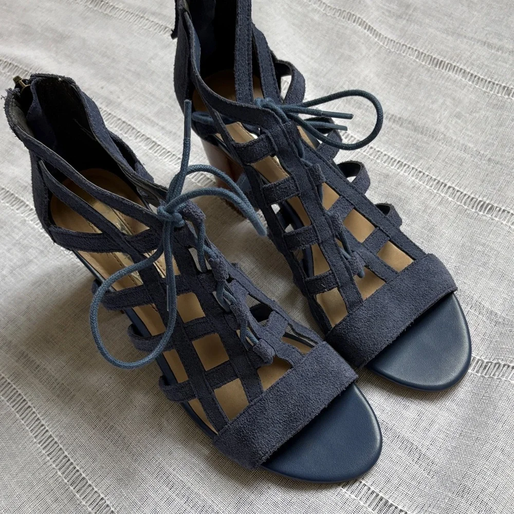 Aubrey Lynn blue suede gladiator-style heels with a tie and zip closure